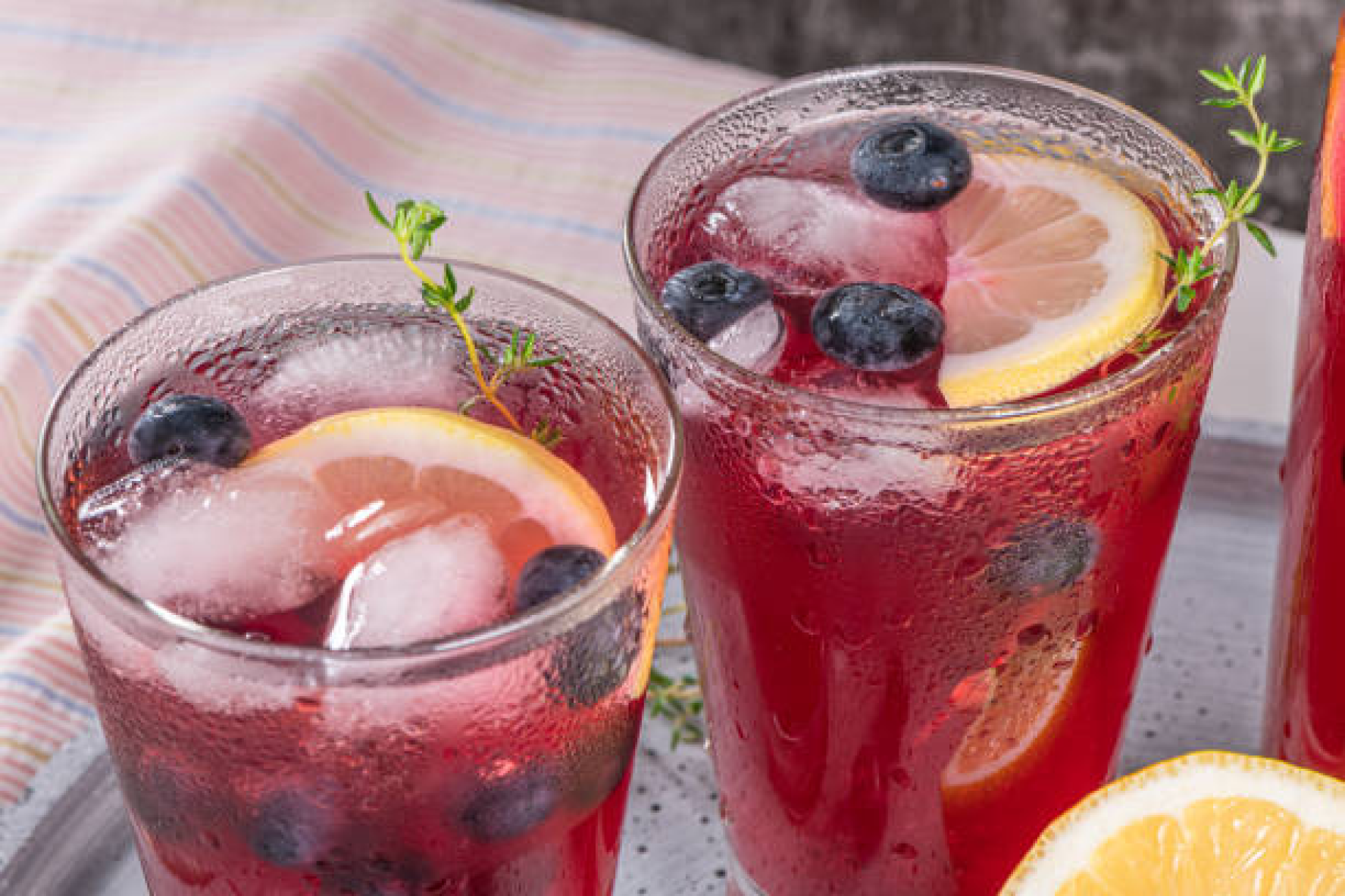 image of pomegranate limeade on picnic blanket